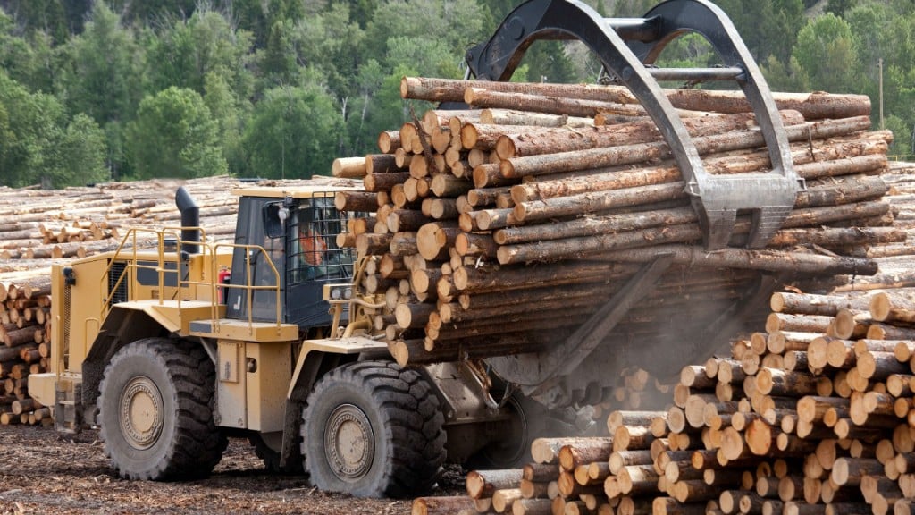 Loader sorting logs on a tidy deck